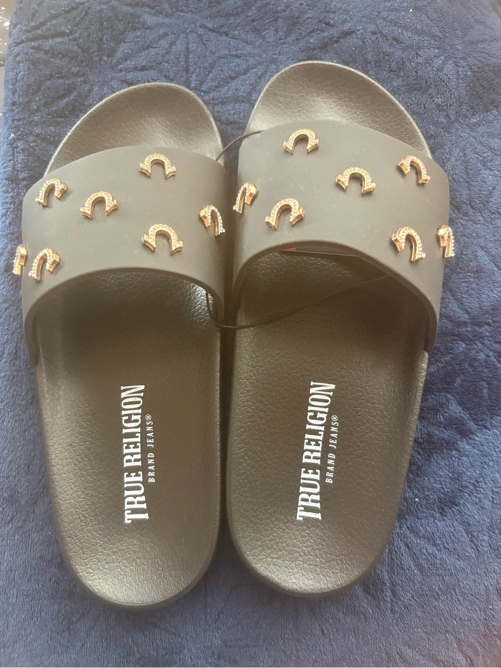 True Religion Black Slide Sandals with Gold Horsebit Studs